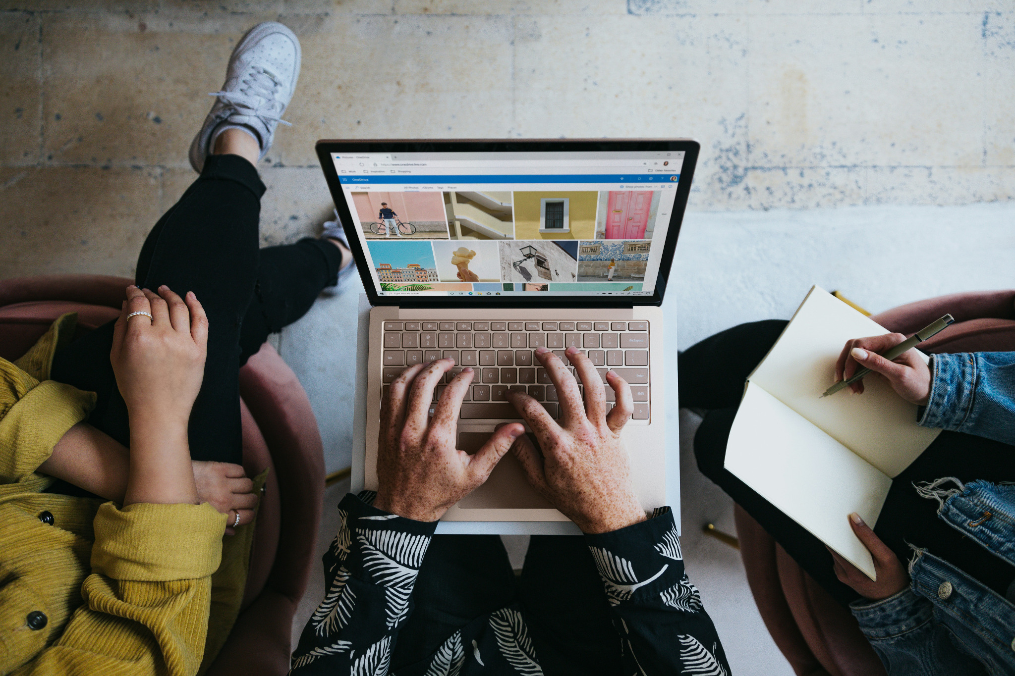 Marketing desk with laptop, notebook and planning material