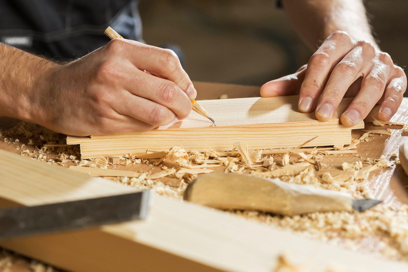 Hand marking a timber board